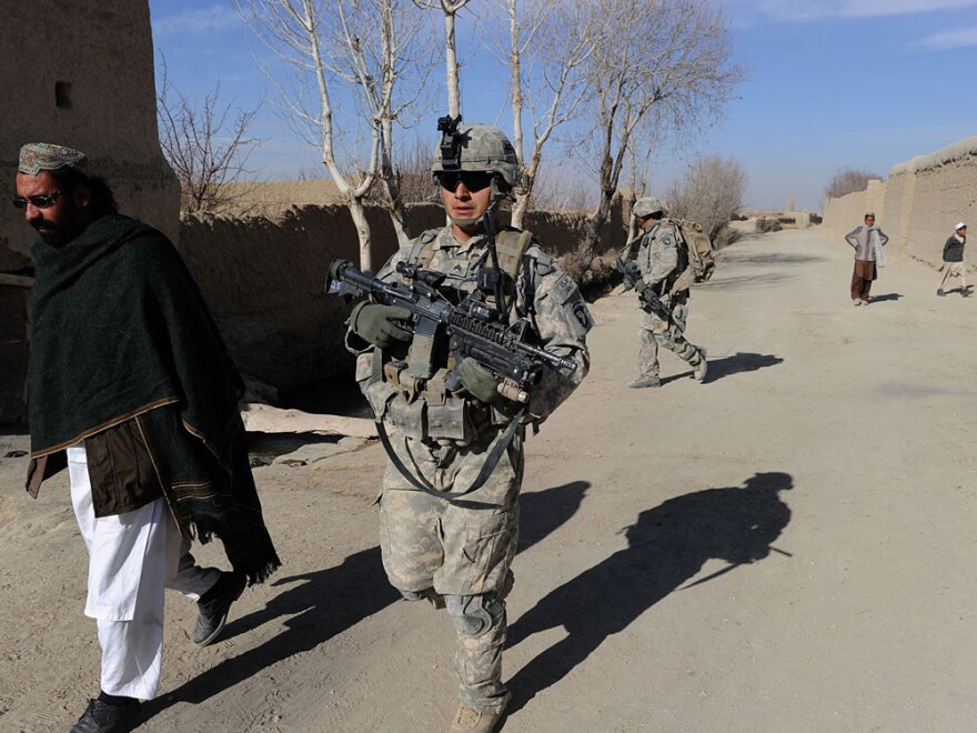 U.S. soldiers of the 3rd Battalion, 187 Infantry, B Company patrol Bangi village, Andar district in Ghazni province, Jan. 6. One of their missions is to persuade local Afghans to participate in a community watch program. So far, no one has signed up.