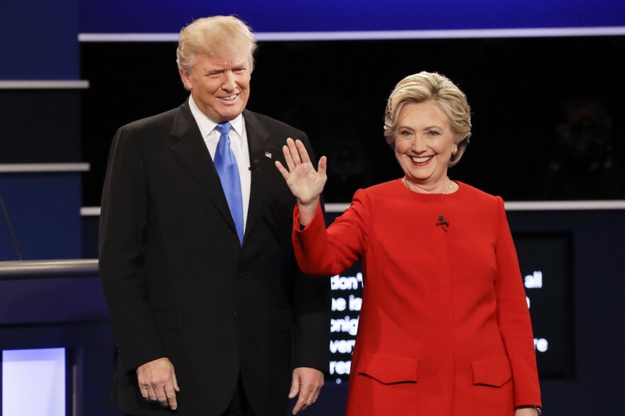 Republican presidential nominee Donald Trump and Democratic presidential nominee Hillary Clinton are introduced at the start of Monday night's presidential debate at Hofstra University in Hempstead, N.Y.