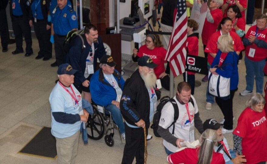 Veterans return to Bluegrass Airport after a day trip to Washington D.C.