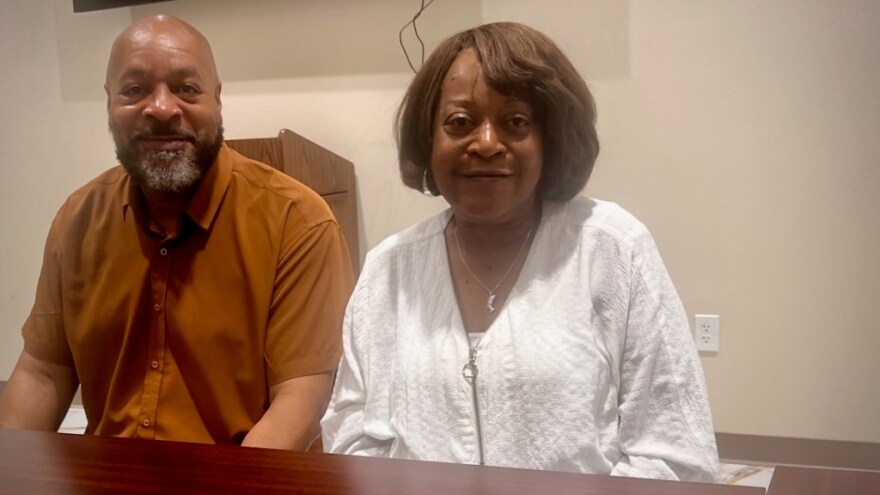Jackson County Legislator Donna Peyton (right) with the Rev. Stan Archie, senior pastor of Christian Fellowship Baptist Church, at a meeting of the Jackson County Benefits Information Network.