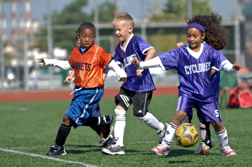 kids playing soccer 