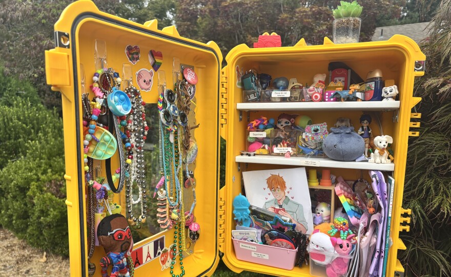 The treasures found inside the box located at W 19th Avenue & Lambert Street in Eugene, pictured on Aug. 14, 2026.