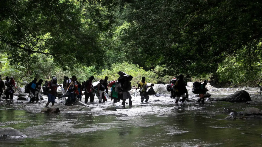 Migrants often trek through treacherous conditions, such as the infamous Darien Gap, to reach safer locations in the aftermath of climate disasters that displaced them from their homes.