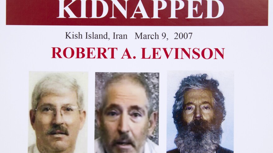 The Trump administration has sanctioned two Iranian officials over the disappearance and likely death of former FBI agent Robert Levinson, shown here in a March 6, 2012, FBI poster.