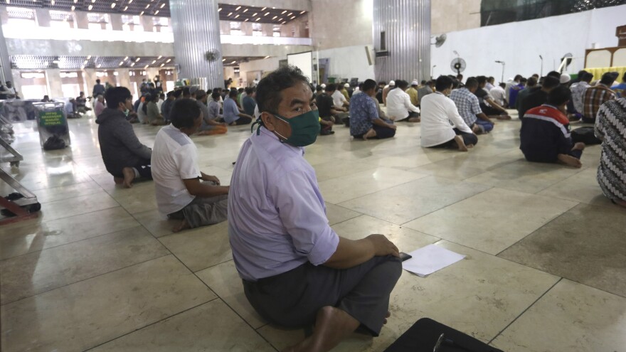 Men perform prayers at Istiqlal Mosque in Jakarta, Indonesia, on Friday.