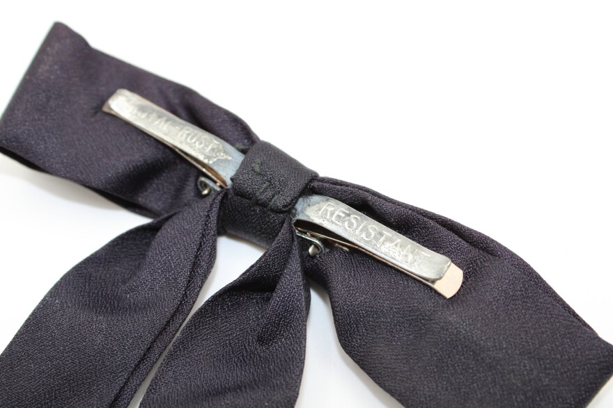 One of Colonel Harland Sanders' black bow ties worn with his iconic white suits is available at a public auction on July 28.