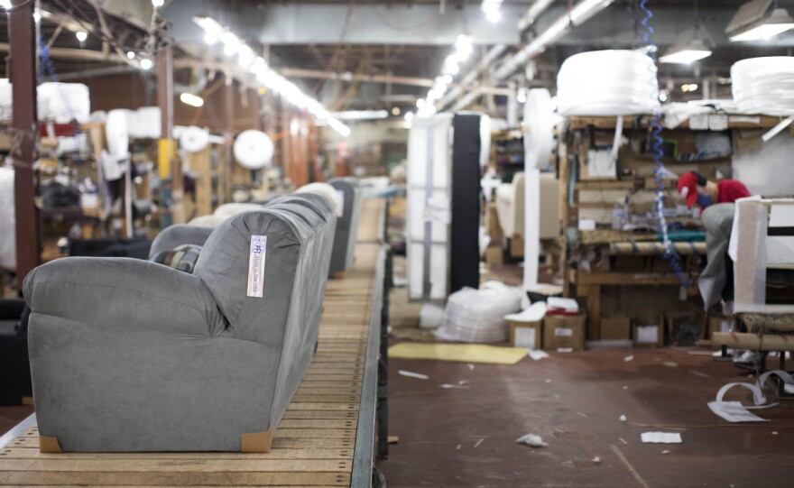 Piedmont Furniture Industries is struggling to keep up with demand in what has become an economic boom in the furniture industry. On Wednesday, Sept. 30, 2020, in Ramseur, N.C., 13 upholsters each build a sofa from beginning to completion