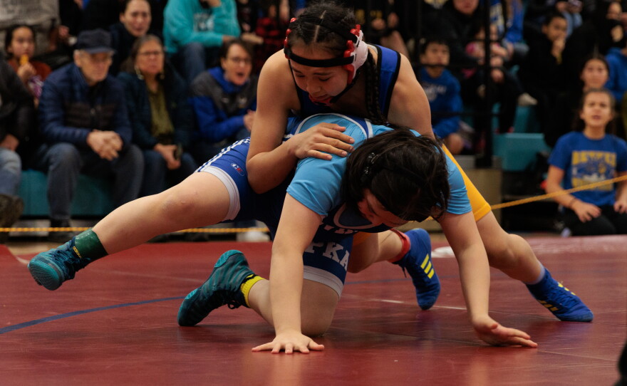 Bethel Junior High wrestler Kaitlyn Wade against a Napaskiak opponent. 