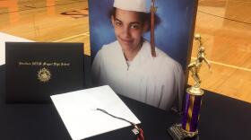 Following her death, Vastoria Lucas' senior photo and high school diploma were displayed at an event at Stratford High School. (Meribah Knight/WPLN)