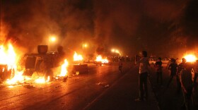 <p>Egyptian Coptic Christians clash with soldiers and anti-riot police during a protest in Cairo against the attack on a church in southern Egypt on Sunday.</p>