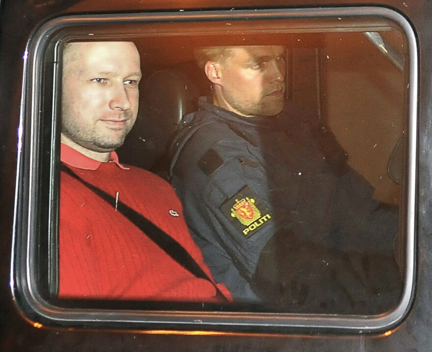 Bomb and terror suspect Anders Behring Breivik leaves the courthouse in a police car in Oslo on July 25.