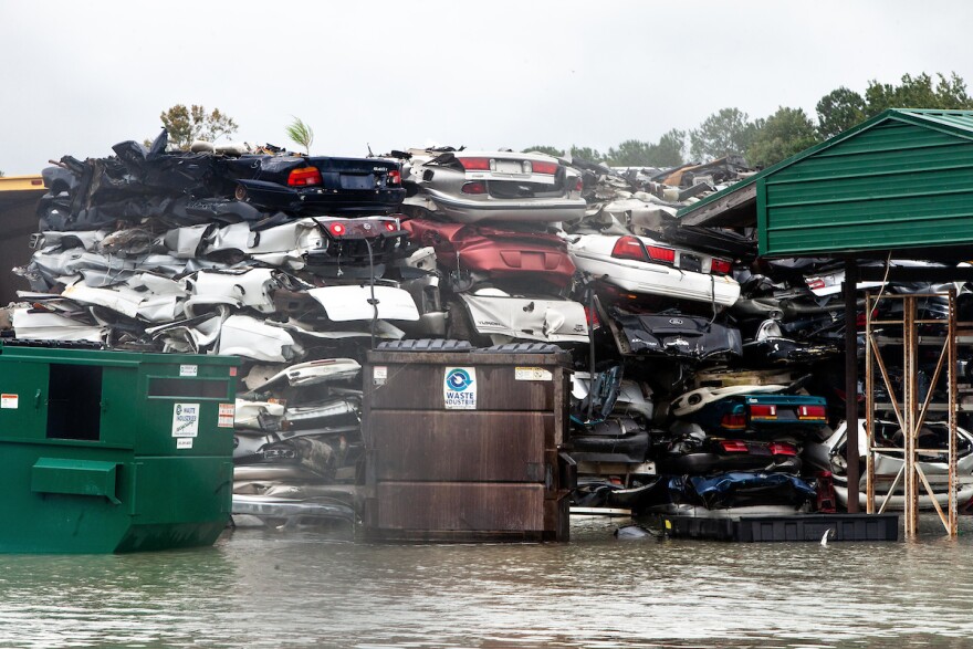 Flood water rises behind Wayne Auto Salvage, a business off highway 117 after Hurricane Florence Goldsboro, N.C., Sunday, Sep. 16, 2018.