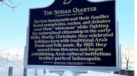 One side of the historical marker in downtown Indianapolis.