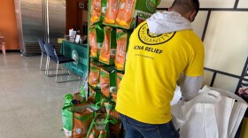 A worker prepares food packages for distribution to clients visiting ICNA Relief's food pantry in St. Louis (photo submitted).