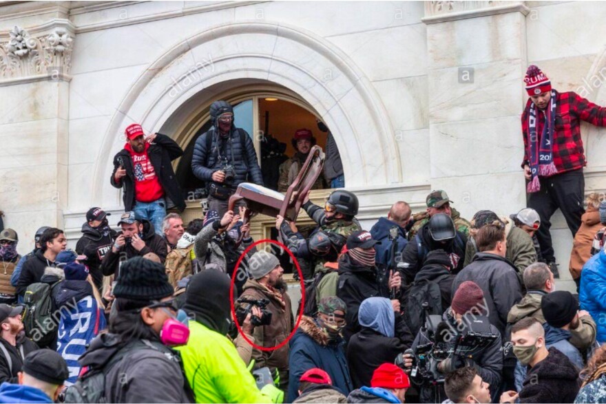 Image from the Statement of Facts as part of the Criminal Complaint. Emphasis not added. Description from the Statement of Facts: “CLEARY stood near the Tunnel entrance as rioters moved furniture from an office toward the Tunnel.”