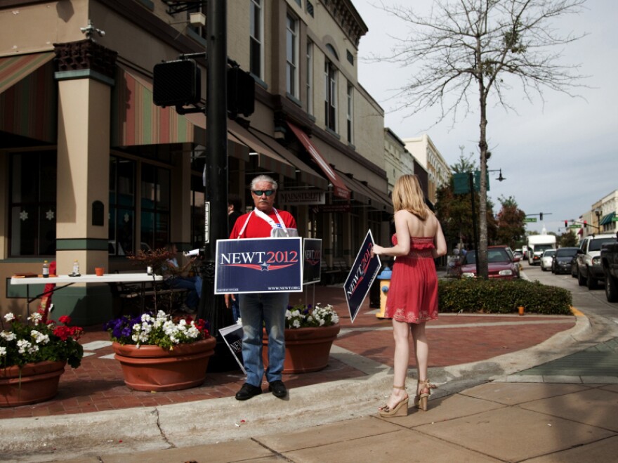 Supporters of Newt Gingrich rally for their candidate Saturday in DeLand, Fla.