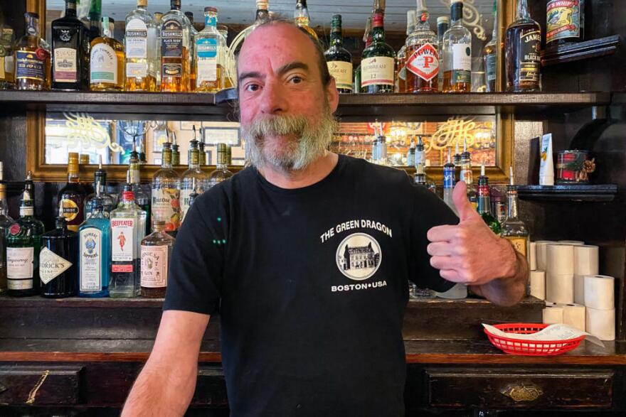 Bartender Chris White has worked at the tavern for more than two decades. (Jesse Costa/WBUR)