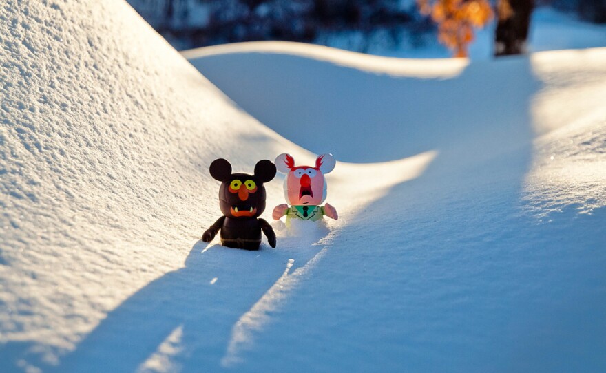 Figurines in snow.