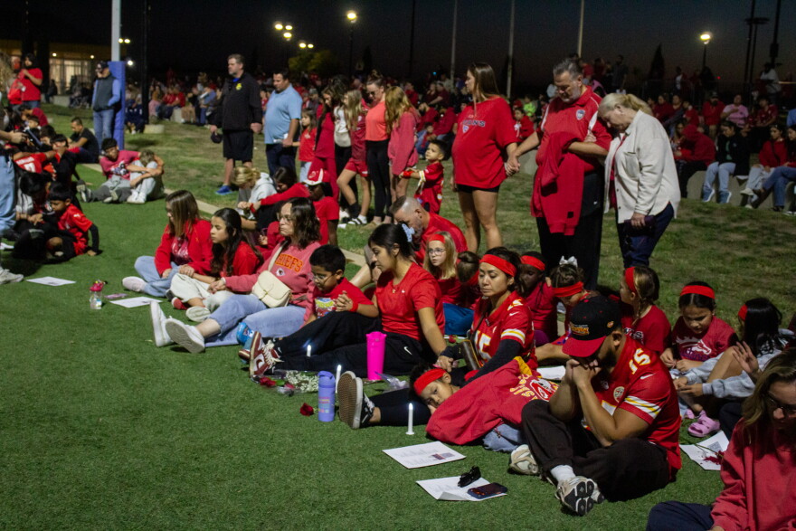 Many players from the Wichita area soccer community wore red to Wednesday's vigil in honor of McPherson City FC's colors.