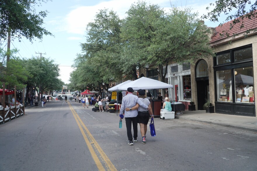 Steve and Maria Dodd wore berets and painted mustaches for Bastille Day in Bishop Arts on July 14, 2026.