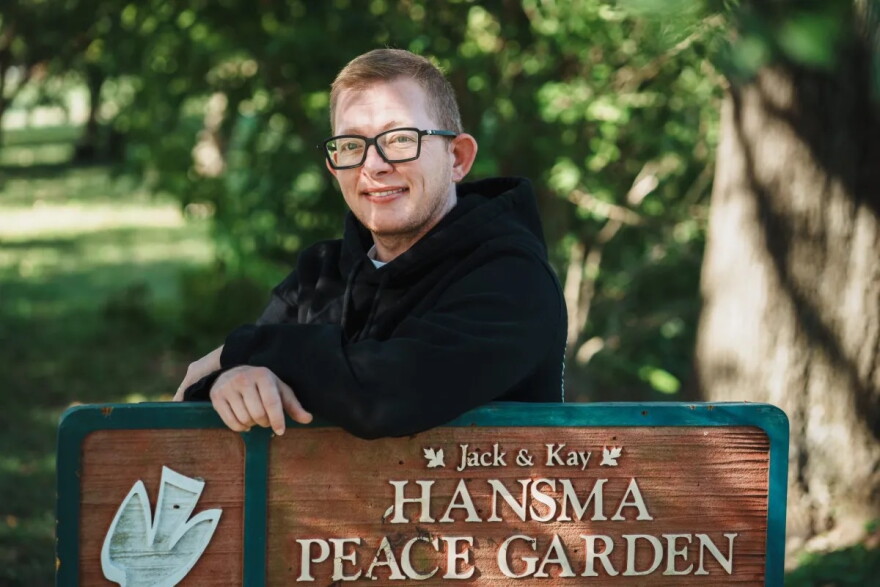 Tracie Hill-Jones, president of the newly formed pride group Out On The Brazos Lake Shore Baptist, stands at the Jack Hansma Peace Garden, where the group's Saturday picnic is planned.