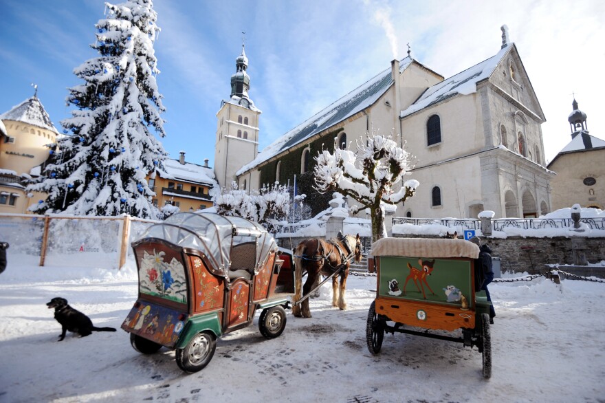 Horse-drawn carriages wait for clients on Dec. 19, 2012, in Megeve.