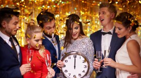 Waiting with friends for midnight on New Year's Eve.