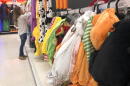 A customer looks through kids Halloween costumes at a Target department store on Tuesday, Oct. 2, 2018, in Aventura, Fla. (Brynn Anderson/AP)
