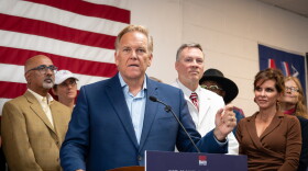 Michigan U.S. Senate candidate Mike Rogers speaks to reporters at a campaign office in Taylor, Michigan on Saturday, September 19.