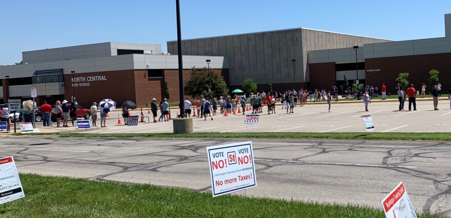 People waited to vote at North Central High School.