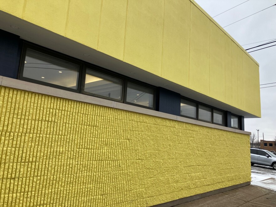 EveryChild painted one side of its new downtown Rock Island building yellow, to match the nonprofit logo.