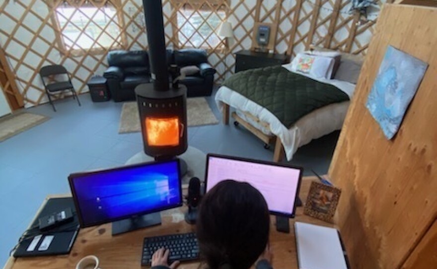 Dr. Anne Zink works from a yurt behind her family home, with three phones and three laptops, sometimes starting at 4 a.m.
