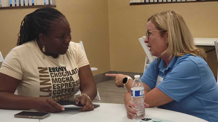 Longtime Volusia County resident Susan Lewis learns about Transform386’s mission from Director Dona Butler at the John H. Dickerson Community Center in Daytona Beach on Thursday, July 24, 2025.