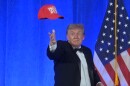 President Donald Trump tosses a "Trump 2028" hat at the White House Correspondents' Association dinner at the Waldorf Astoria Washington DC, Friday, July 24, 2026, in Washington. (AP Photo/Rod Lamkey, Jr.)
