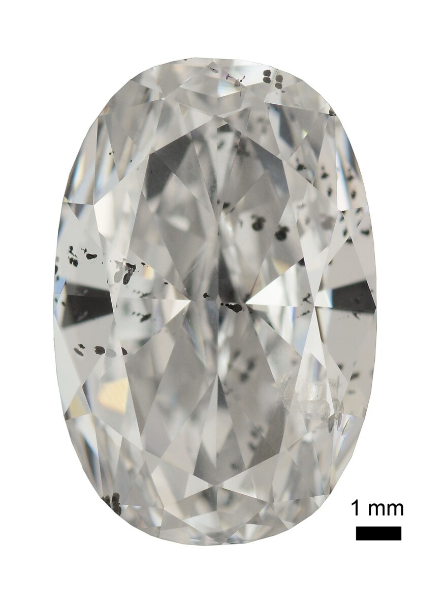 Big diamonds like this one can contain tiny bits of metal from far underground, visible as black spots inside the gem.