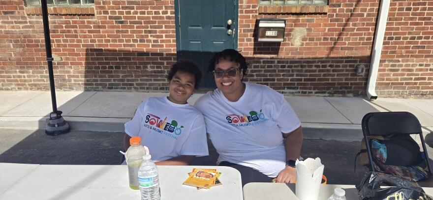 Laura Dykes, president of the Hollins Roundhouse Neighborhood Association, and her son Taylor Wambugu serve as a point of contact to make sure the festival goes smoothly.