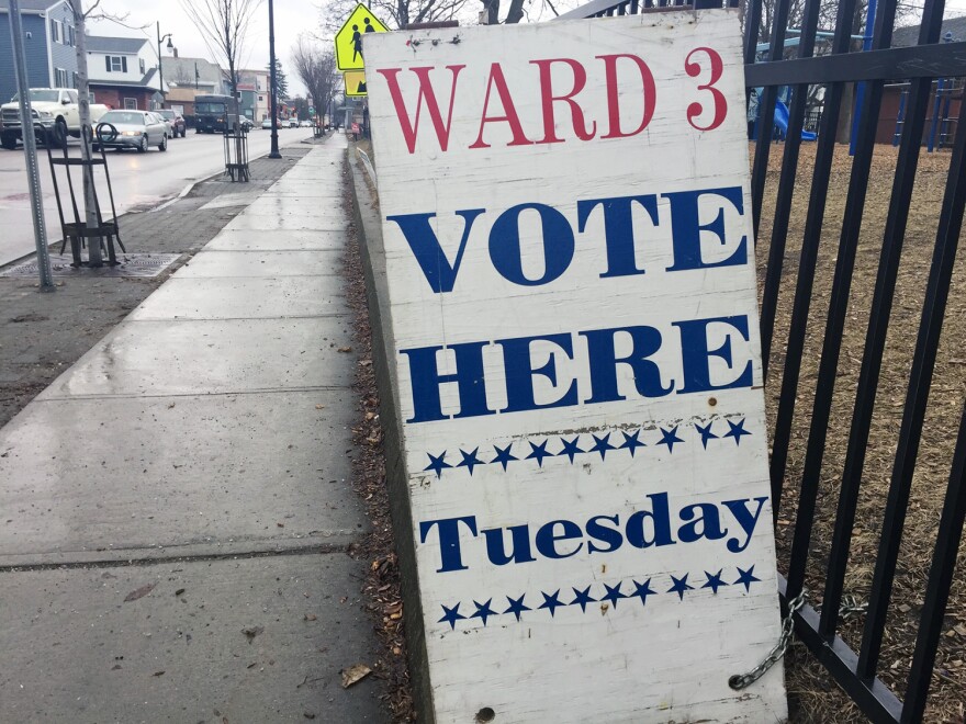 A photo of a sign reading ward 3 vote here Tuesday