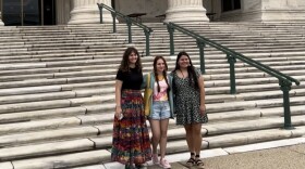 Stilwell High students (left to right) Tyla, Reagan and Jimma stand in front of the Field Museum in Chicago.