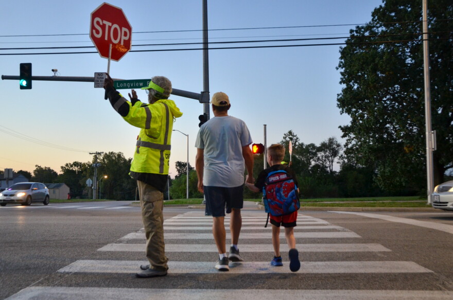 The Hickman Mills School District hired a company to staff crossing guards this school year, including at the intersection where Hazen Workman-Duffy was fatally struck by a car.