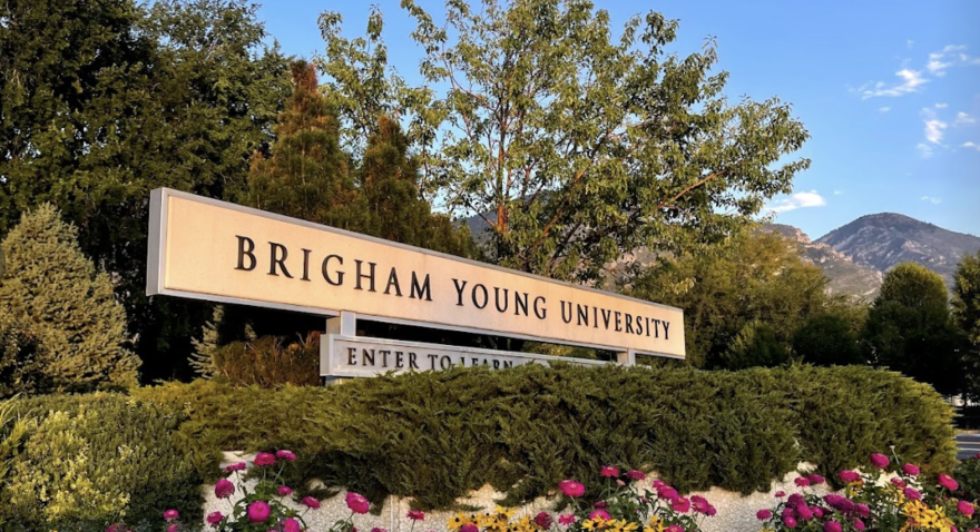 Brigham Young University's athletics department says it "sincerely apologizes" to the fan who was banned for allegedly yelling racist slurs at volleyball players from visiting Duke University.