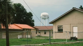 A water tower looms over the small town of Bowling Green, Florida on Tuesday, June 30, 2026. The community would see 98% of its primary residences taken off the tax rolls, if voters approve the proposed property tax rollback on the ballot in November.