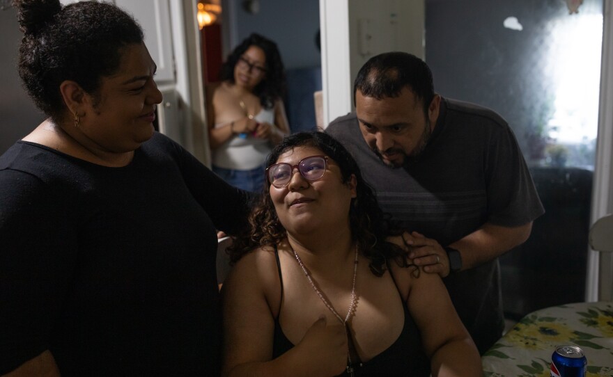 Family members including her aunt Marlen Gonzalez, left, and uncle Selvin 'Paco' Espinoza, left, talk with Genesis Espinoza Sierra, center, at her family's home in Wallace on April 17, 2026. Her brother Edilberto Espinoza Sierra was shot and killed by the Wilmington Police Department in the early morning hours of March 8 following an incident in a downtown Wilmington parking garage. Espinoza Sierra was incorrectly identified as a suspect before he was killed and now his family is seeking answer and accountability.