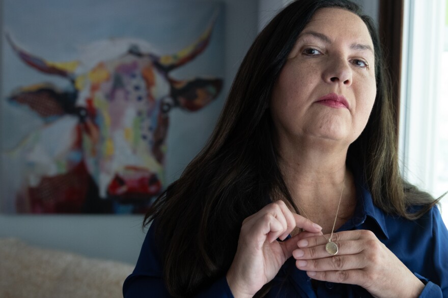Hernandez wears a necklace bearing Cody's thumb print as a constant reminder of their relationship.