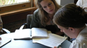 Interns from Tulane Law School work one-on-one with local artists and others.