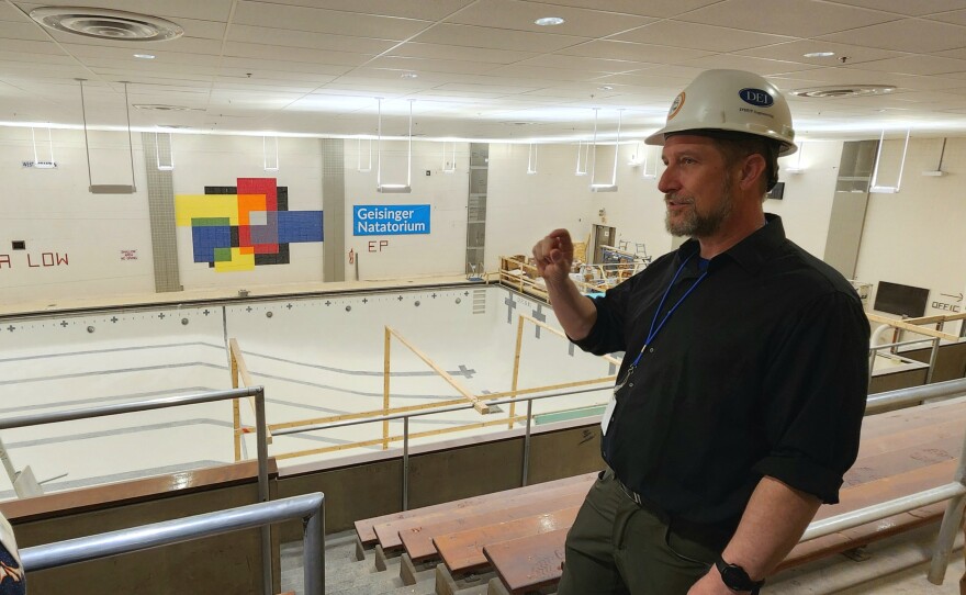 Ethan Fick of D'Huy Engineering explains some of the updates to the pool at West Scranton Intermediate School.