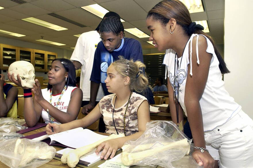 A group of Indianapolis Public Schools students takes part in one of the first Science Bound activities in 2005 on the Purdue University campus.