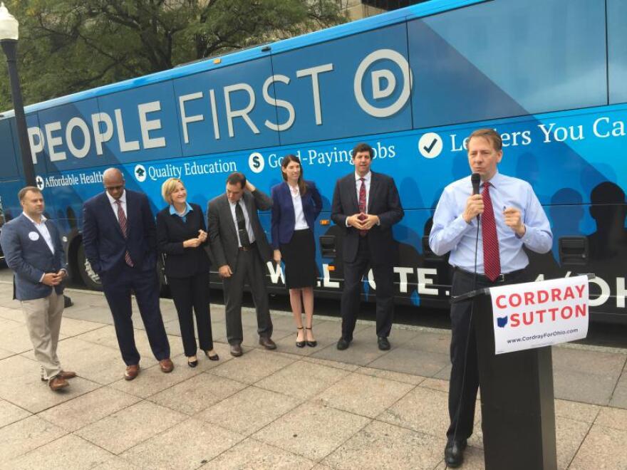 photo of Rich Cordray in front of campaign bus