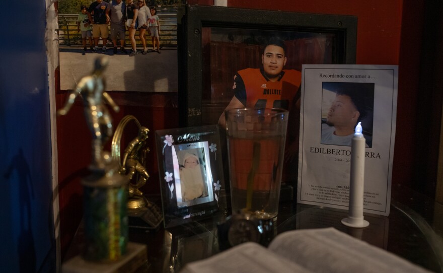 Memorabilia from Edilberto Espinoza Sierra's life sits on the table next to his bed at his family's home in Wallace on April 17, 2026. Espinoza Sierra was shot and killed by the Wilmington Police Department in the early morning hours of March 8 following an incident in a downtown Wilmington parking garage. Espinoza Sierra was incorrectly identified as a suspect before he was killed and now his family is seeking answer and accountability.