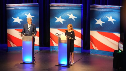 U.S. Rep. Ralph Norman, R-S.C., left, looks on as Sen. Darline Graham, R-S.C., speaks during a special GOP Senate runoff debate to replace the late Sen. Lindsey Graham, R-S.C., on Tuesday, Aug. 18, 2026, in Newberry, S.C. (AP Photo/Meg Kinnard)