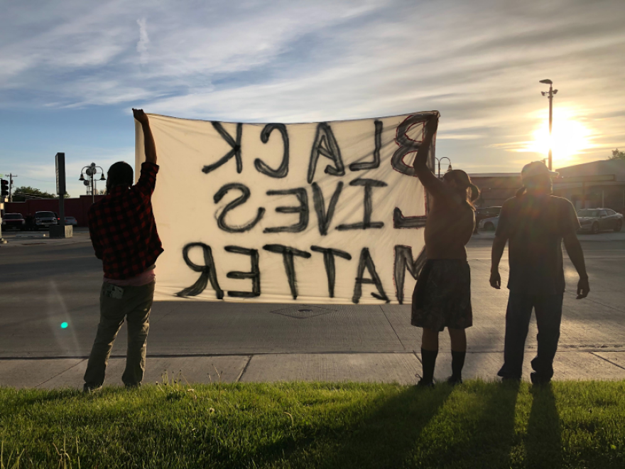 Micah Lott (left) leads a Black Lives Matter demonstration in Riverton, Wyoming.